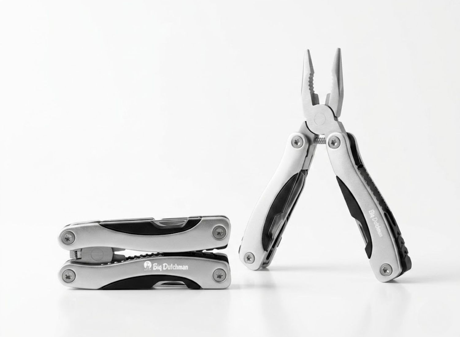 Rozłożony stalowy multitool z kombinerkami i zestawem narzędzi. Niezawodne gadżety reklamowe dla branży przemysłowej.